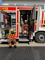 Feuerwehrleute in Ausrüstung