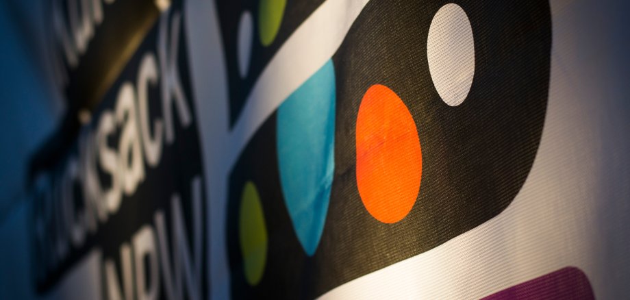 Ein Banner mit dem Logo des Kulturrucksacks. 